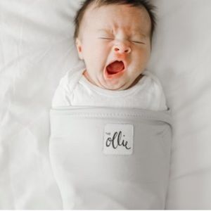 New with box Ollie Swaddle Color Grey includes wash bag